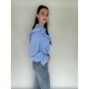 Blauwe ruffle blouse